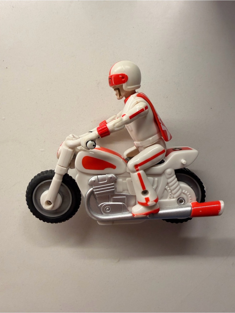 Toy Story 4 Duke Kaboom Pull and Go Pull String Motorcycle Toy Read